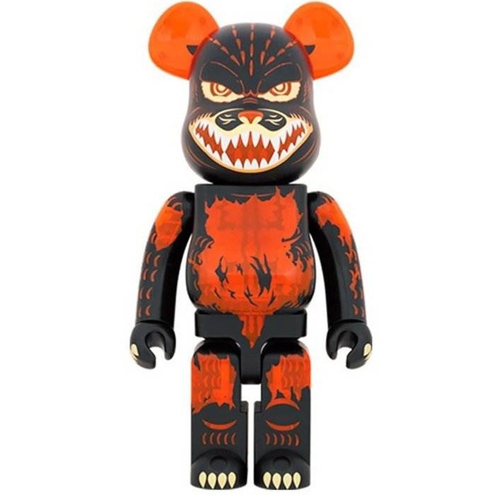 1000 Bearbrick Melting Godzilla figure in clear orange with black and aggressive facial design